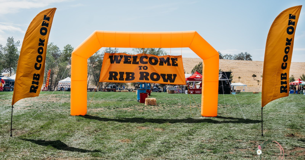 Welcome to rib row inflatable sign on a field before the competition started.