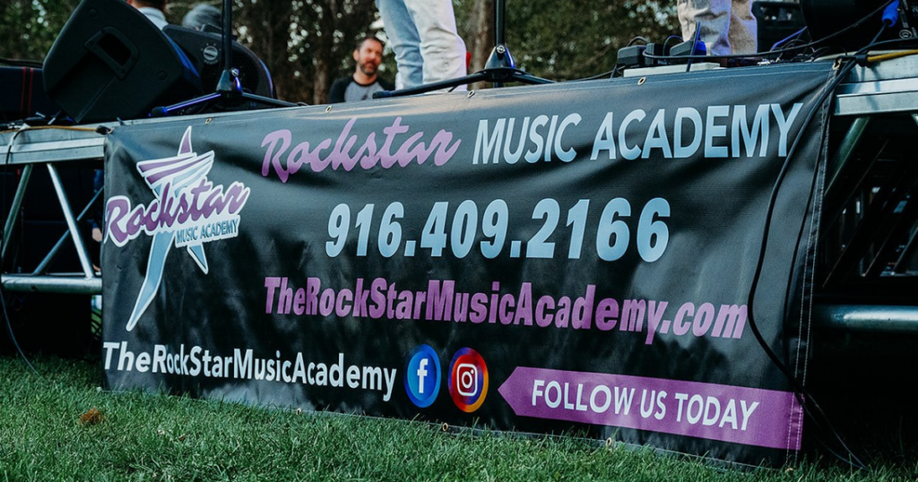 The Rockstar Music Academy banner with logo and phone number.