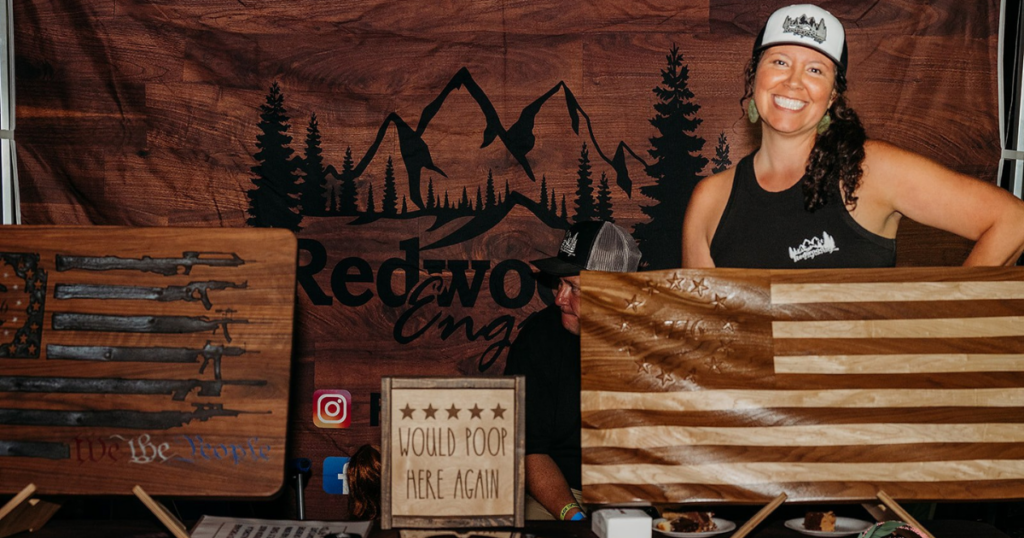Sponsor of 12 Bridges Rib Cook-Off competition, Lincoln local Rachelle Schumacher showcasing custom made-to-order cutting boards by Redwood Engravings at 12 Bridges Rib Cook-Off.