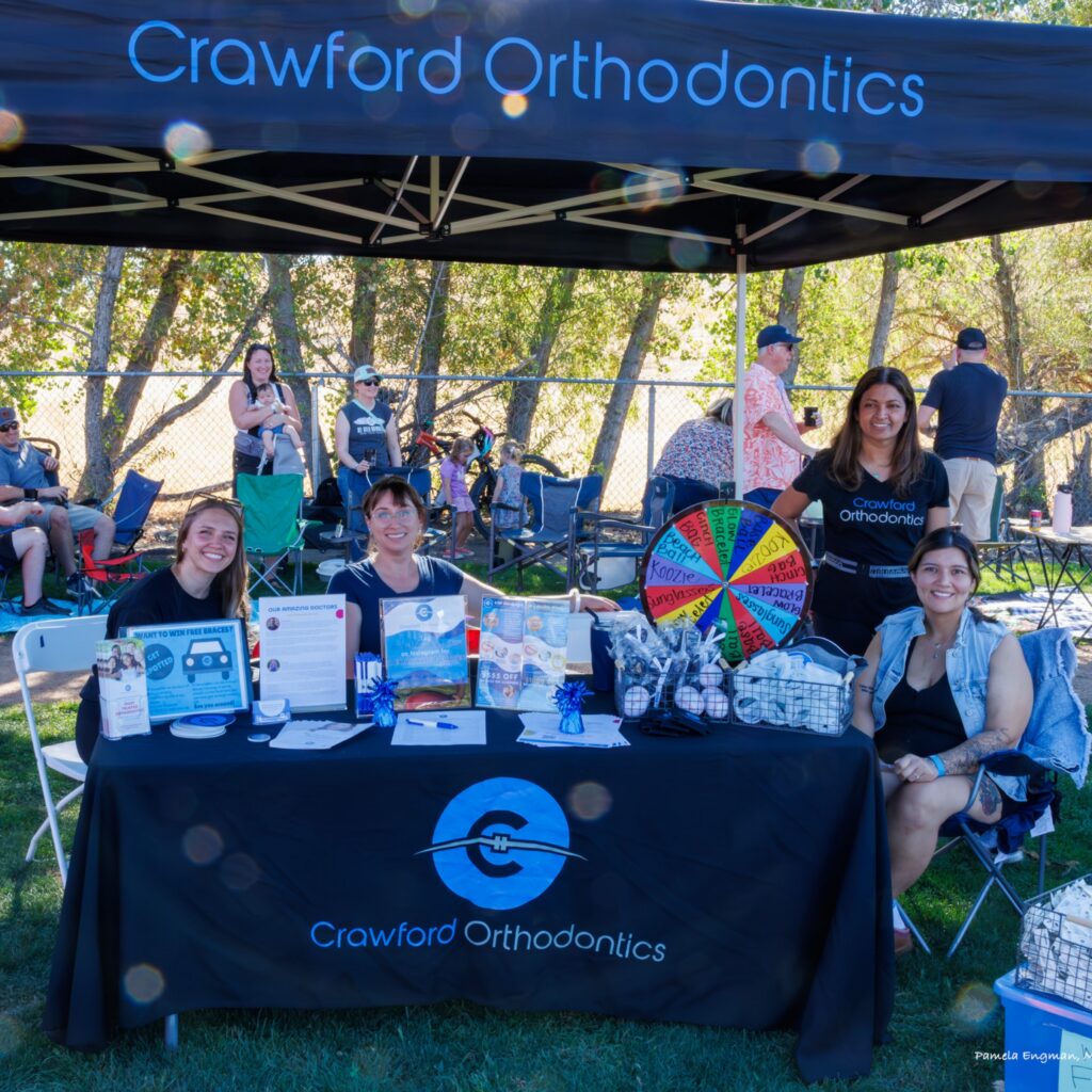Crawford Orthodontics sponsor tent greeting guests at the 12 Bridges Rib Cook-Off in Lincoln, CA.